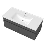 Meuble de salle de bain couleur chêne suspendu avec vasque en céramique, deux portes