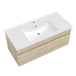 Meuble de salle de bain couleur chêne suspendu avec vasque en céramique, deux portes
